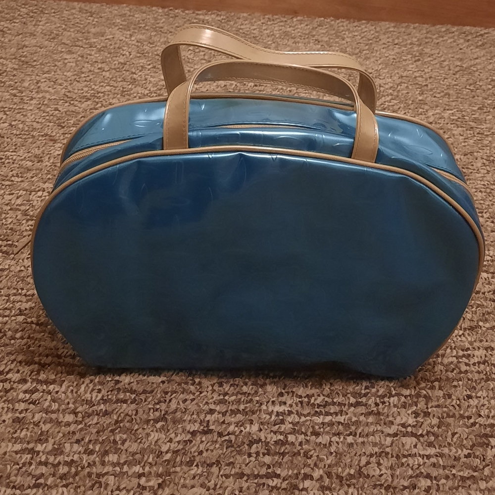 Clinique Travel Cosmetic Bag.